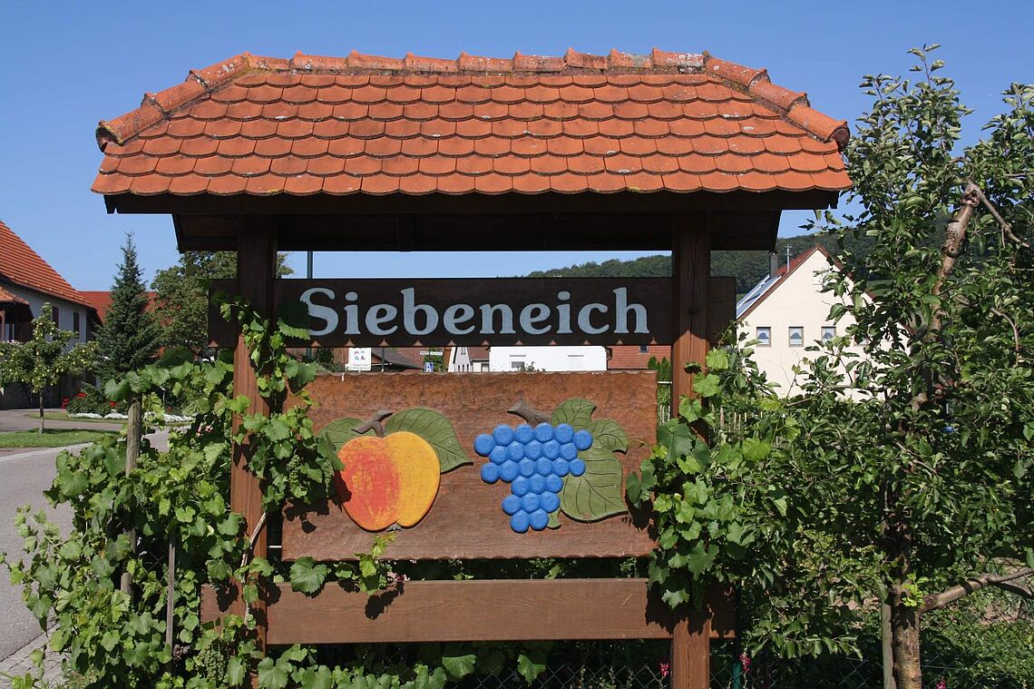 wooden board at the start of village of Bretzfeld-Siebeneich